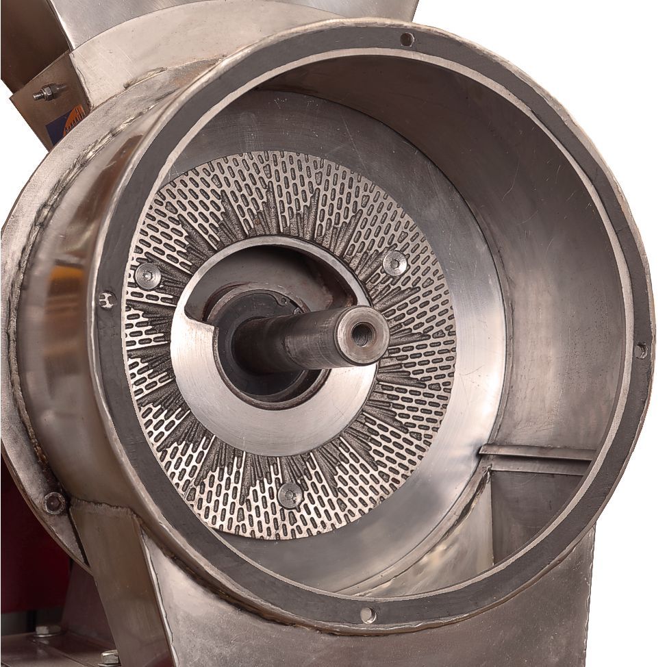 Milling chamber of ABC Hansen disc mill with stainless steel grinding burrs. 