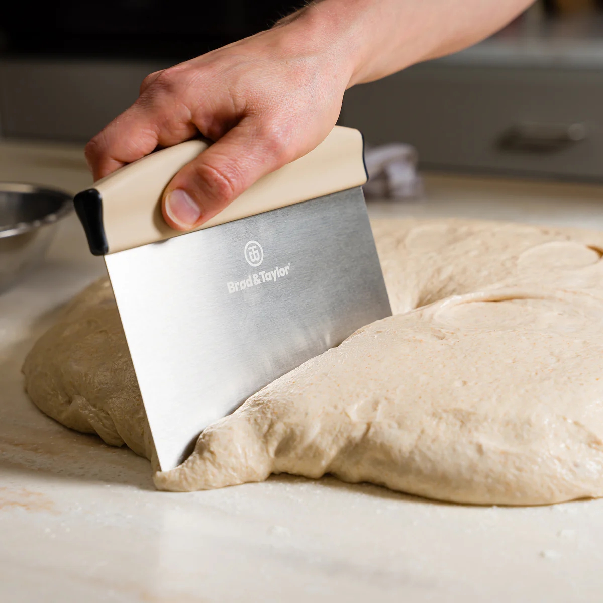Stainless steel bench knife with soft-grip handle