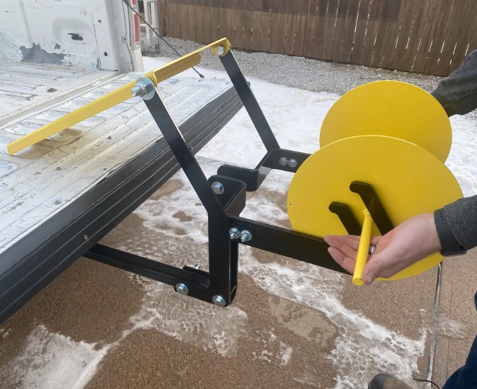 Handles on Unroller Arm
