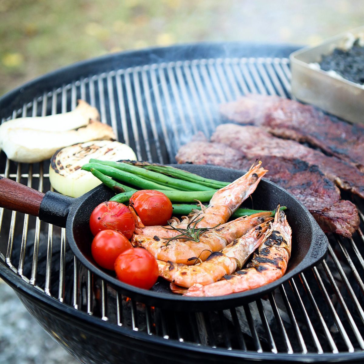 Cast iron skillet meal on grill