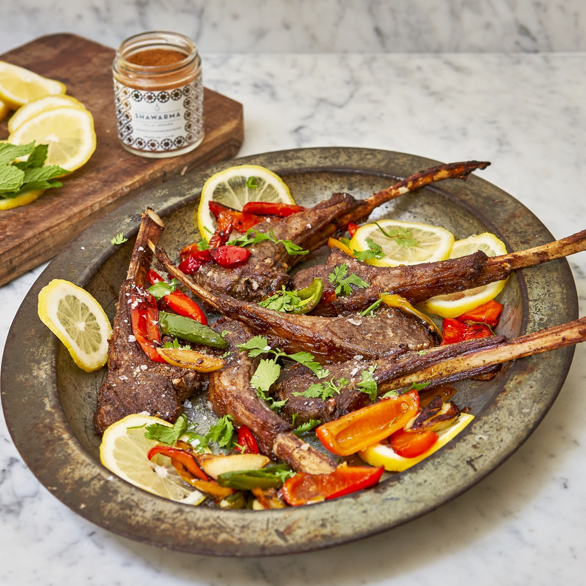 Villa Jerada Shawarma next to seasoned meat and vegetables