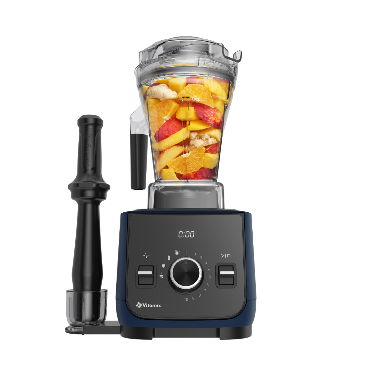 Vitamix Ascent X2 filled with fruit with tamper