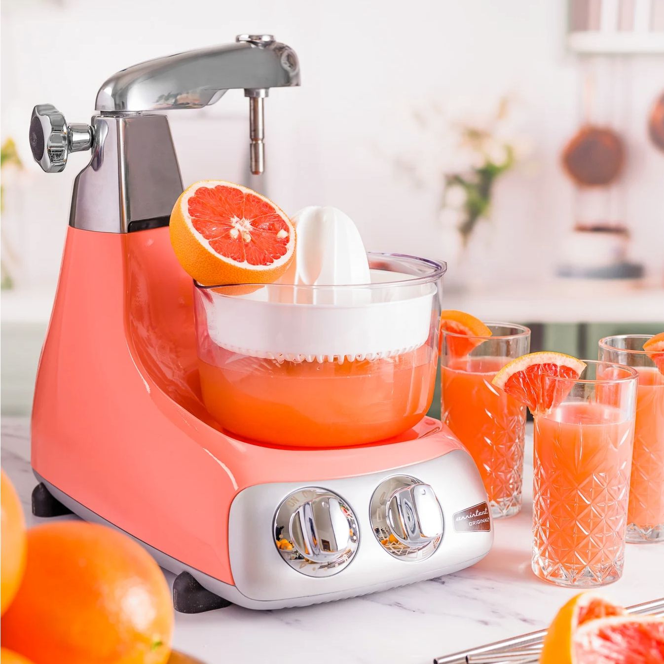 Coral Crush mixer with optional citrus juicer attachment
