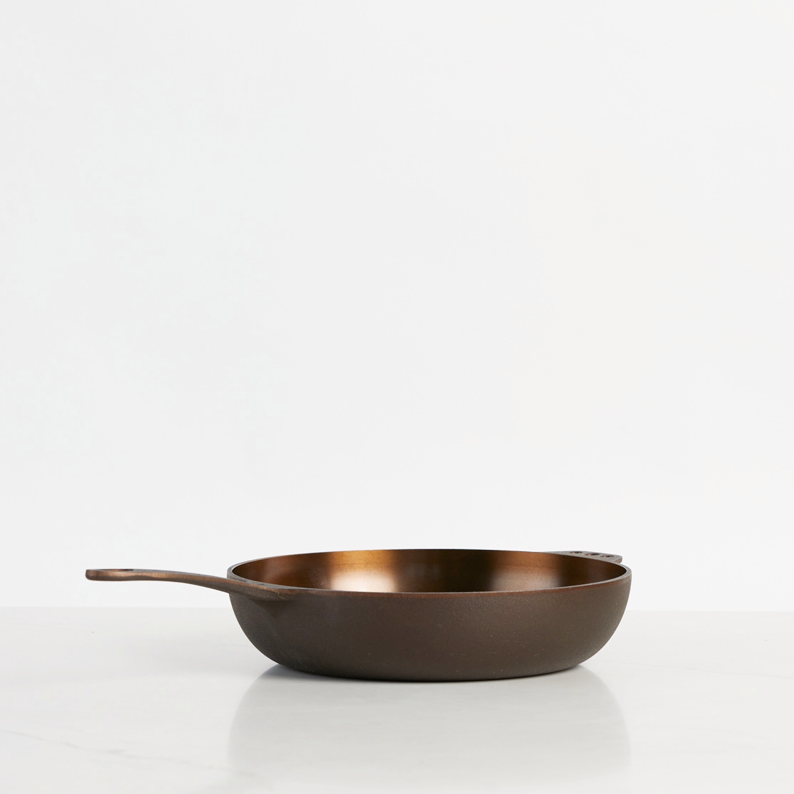 even heat storage in deep cast iron skillet