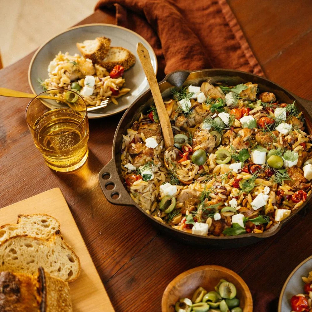 12 inch skillet with baked dish on dinner table