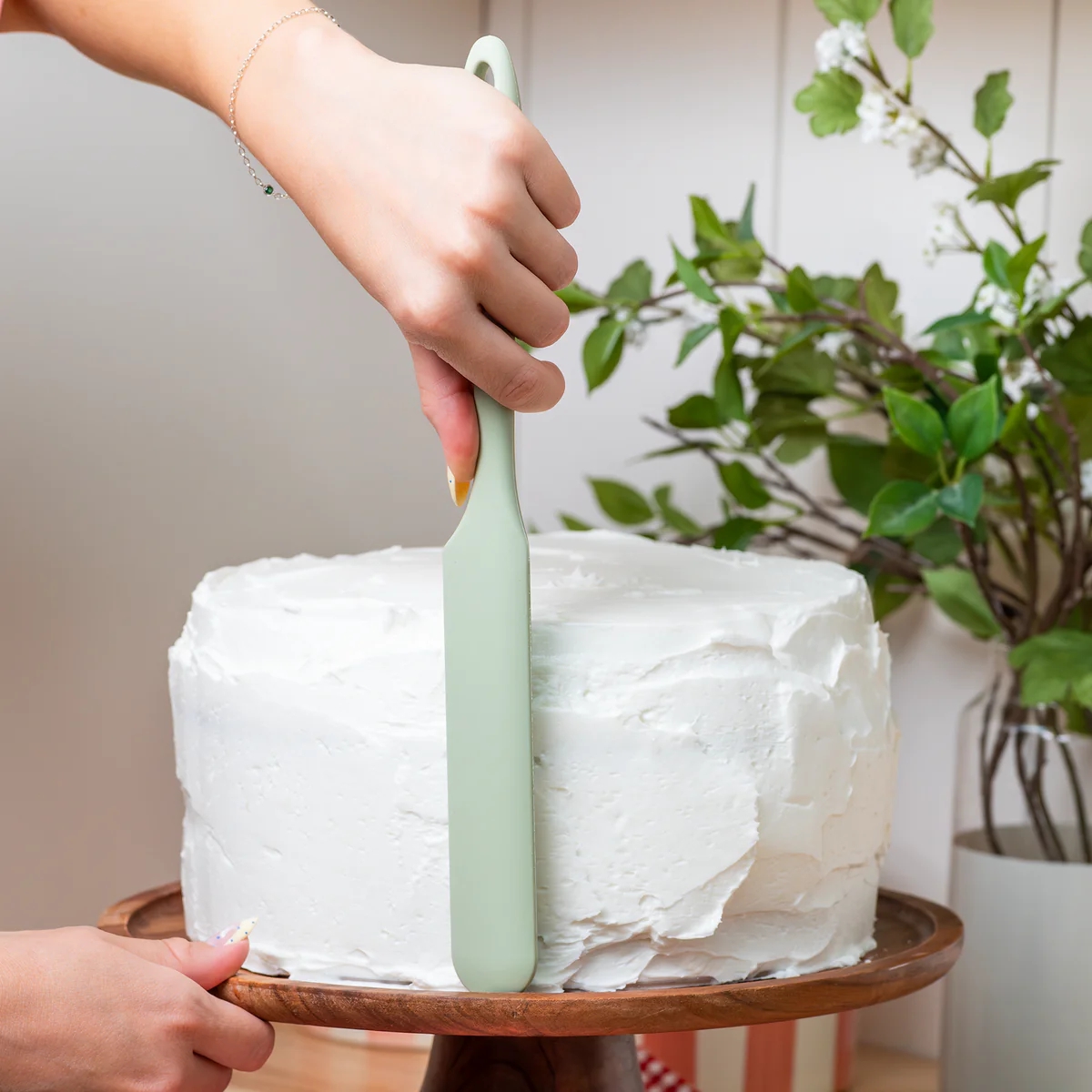 nutrimill spurtle used as cake frosting spreader