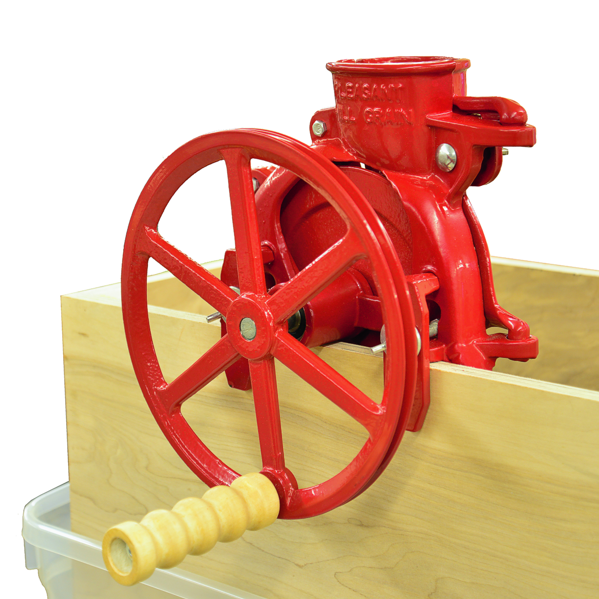 Maximizer hand crank corn sheller mounted on box.