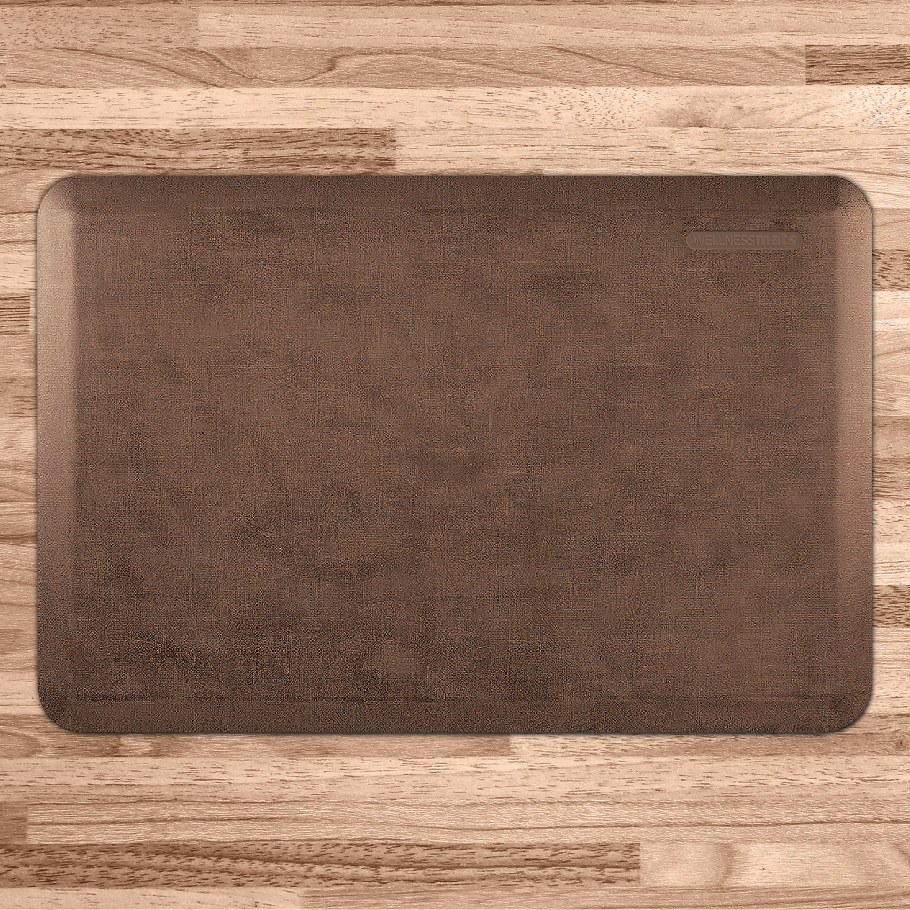 light antique wellness mat on wood floor