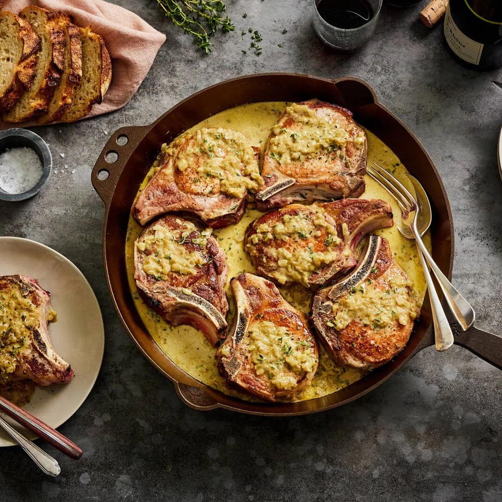 pork chops in sauce in smithey 14 inch skillet