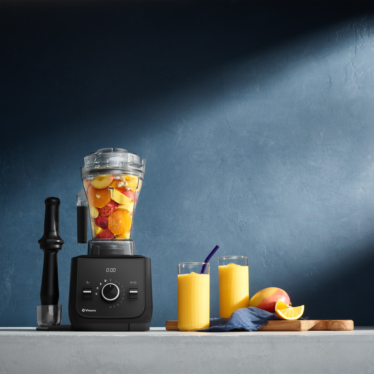 vitamix ascent x2 on countertop filled with fruit