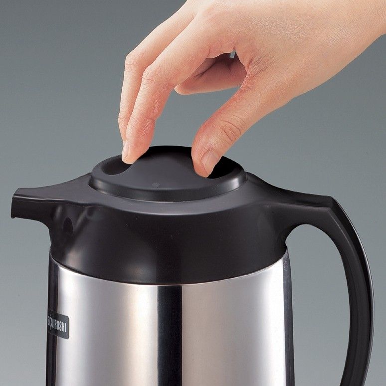 Twist sealed spill proof lid