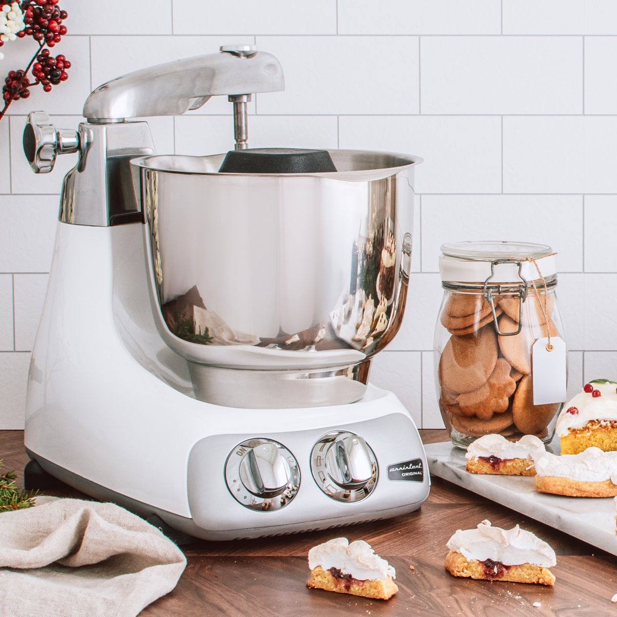 Ankarsrum stainless double beater bowl on white mixer