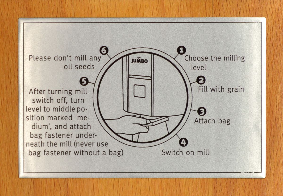 Instruction plate on KoMo Jumbo grain mill