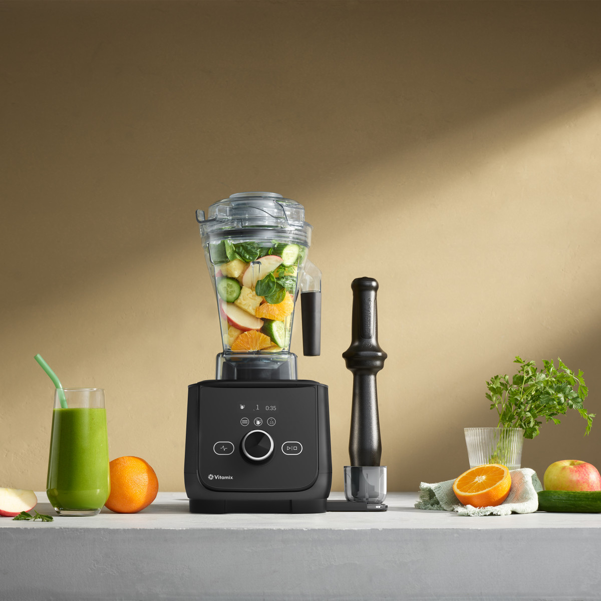 ascent x4 blender staged with vegetable fruit smoothie
