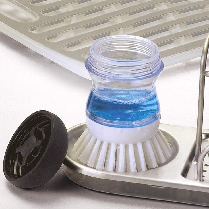 Soap dispensing palm brush scrubber
