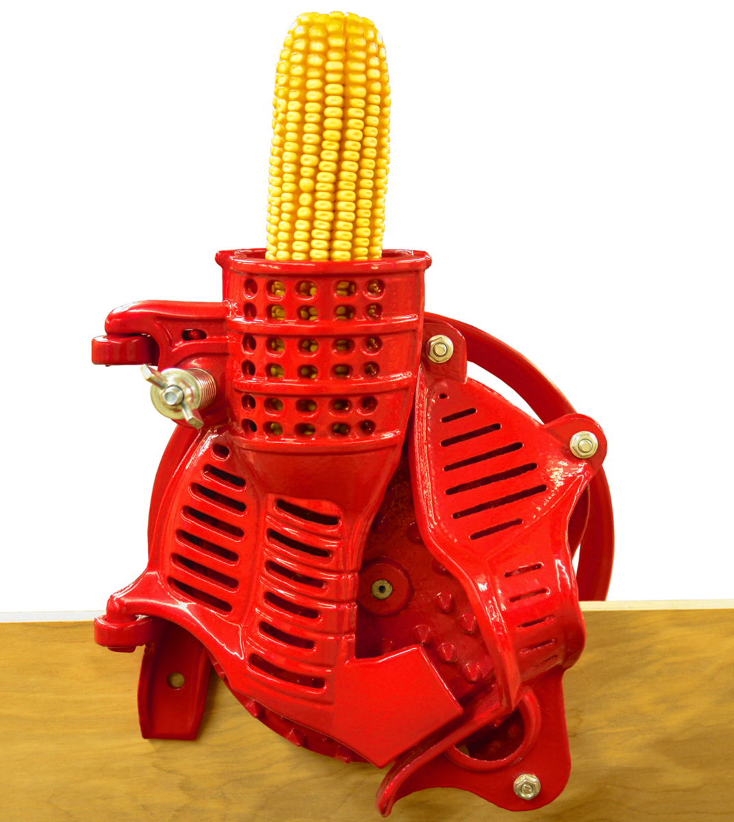 Maximizer manual hand crank corn sheller with ear of corn. 