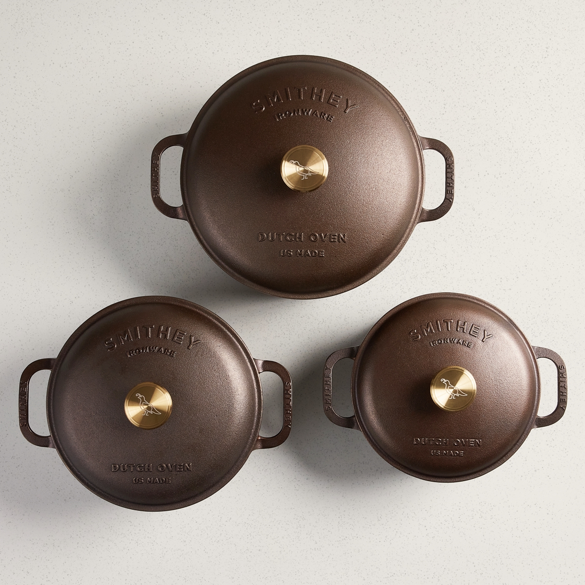 Smithey Cast Iron Dutch Ovens, all three size options with lids