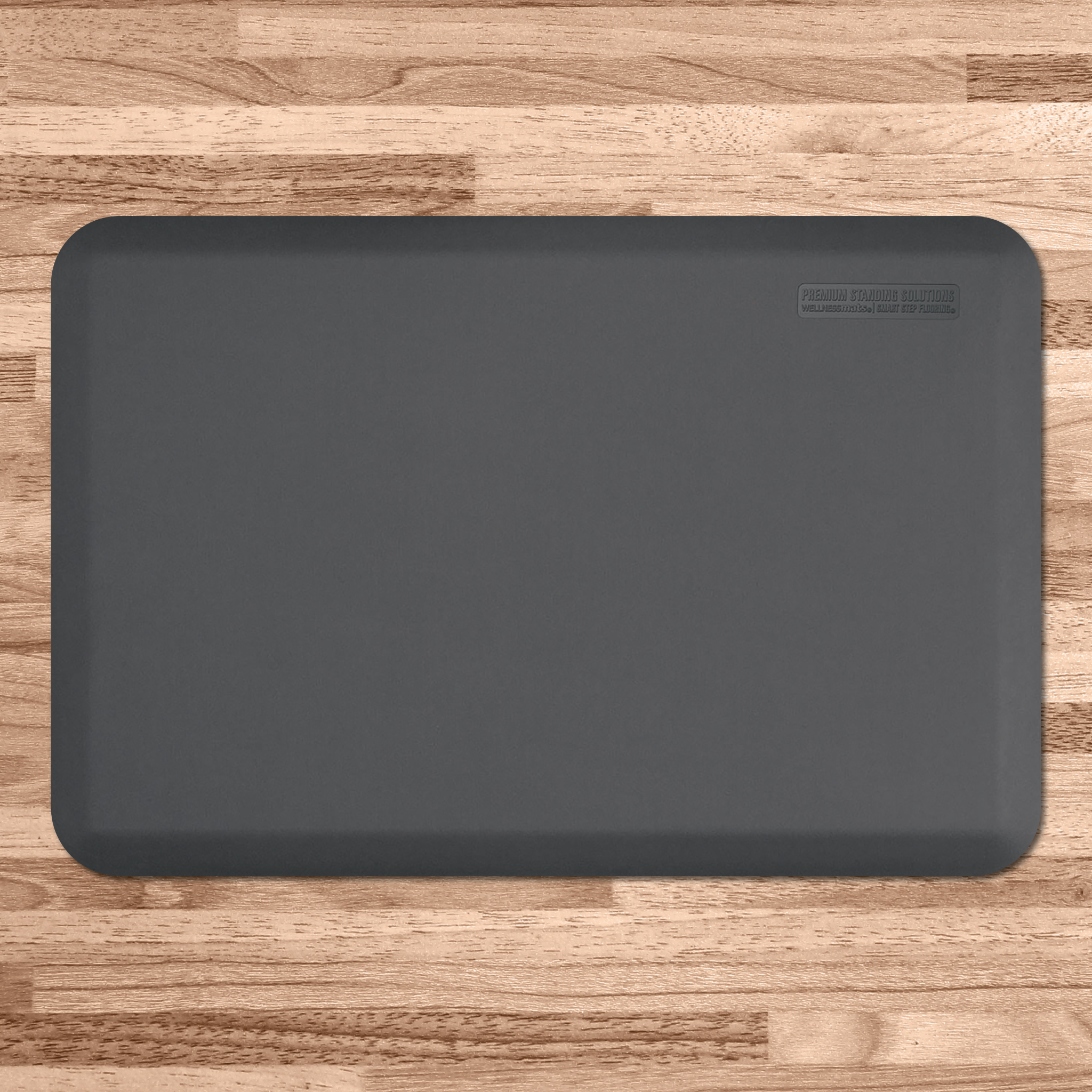 gray wellness mat on wood flooring