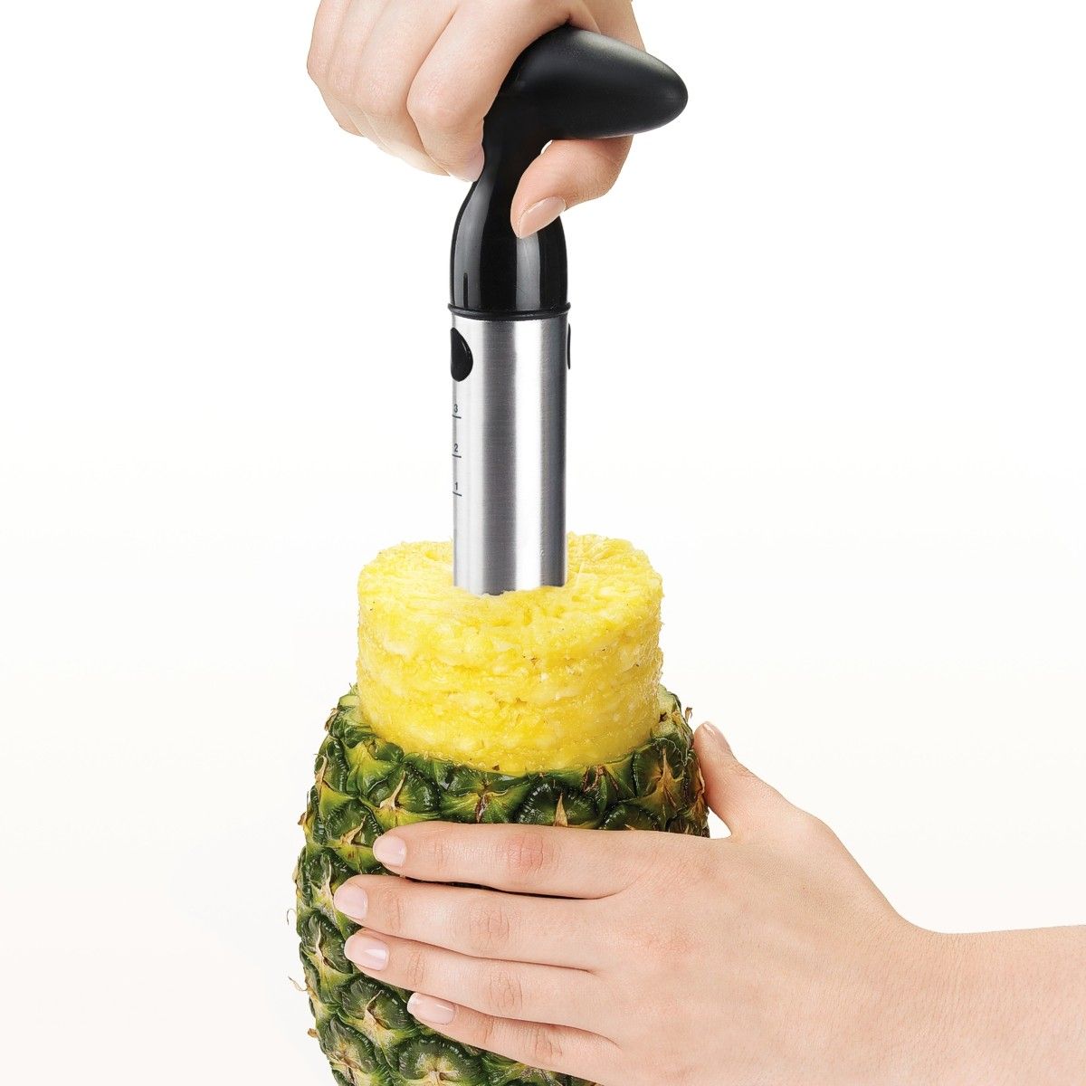 Coring a pineapple