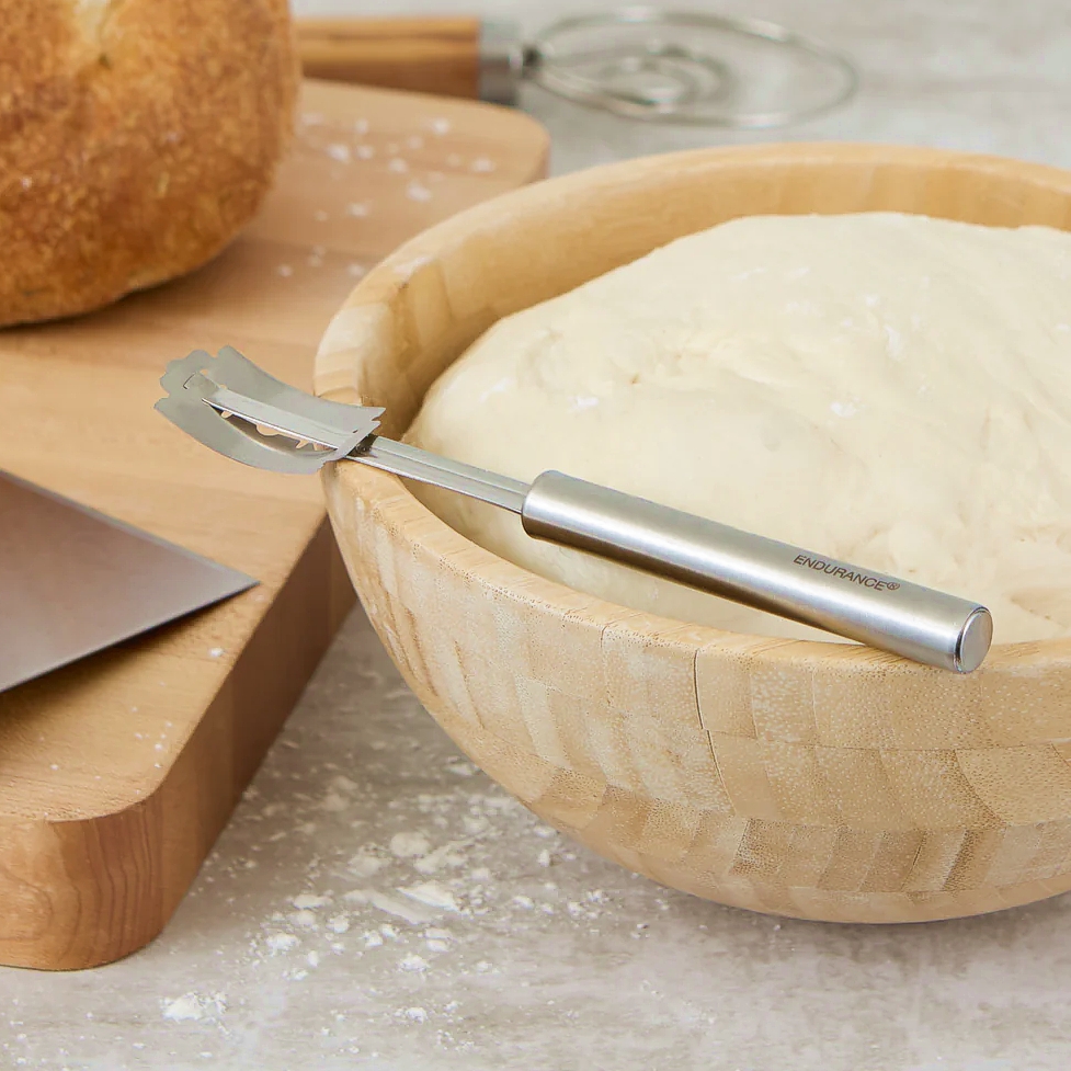 bread lame shown next to dough