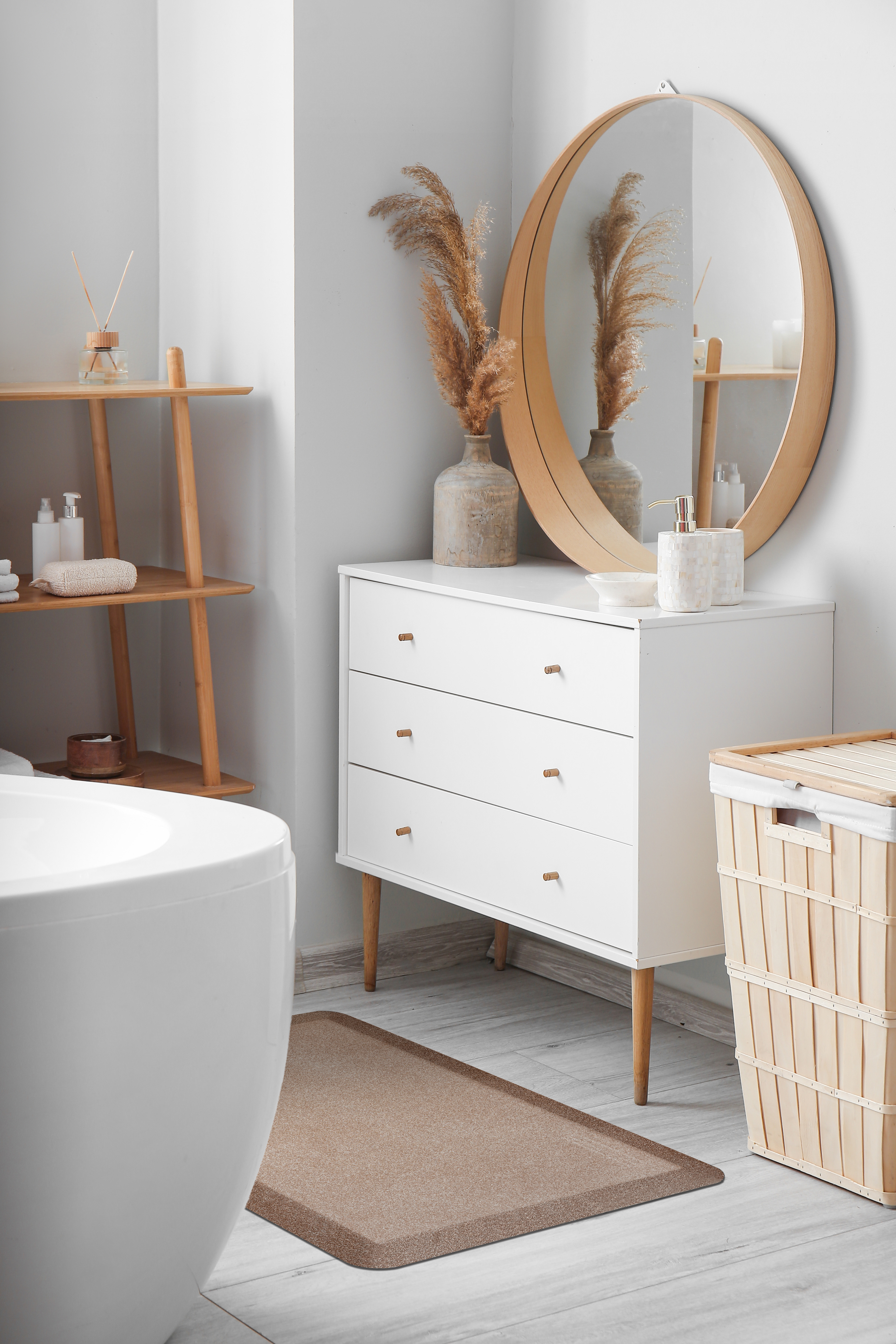 Granite Sand wellness mat shown in front of bathroom vanity