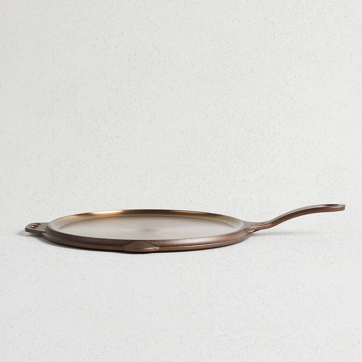 Smithey Ironware Flat Top Griddle, 12 inch, side view of handle