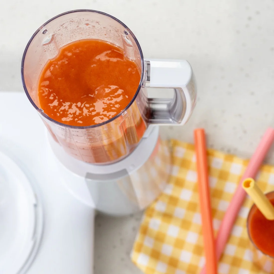 bosch MX3 blender staged with tablecloth and straws