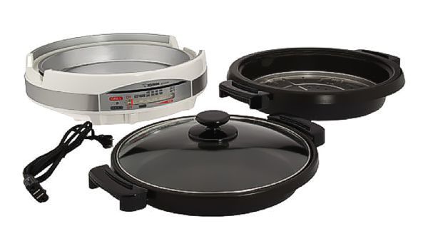 Removable pan and heating element for easy cleanup and storage.