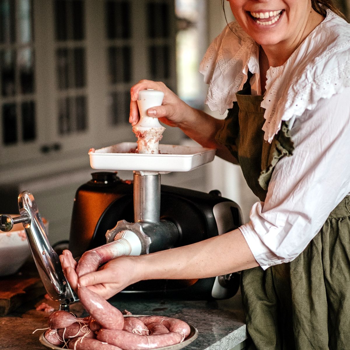 Three sausage stuffers come standard with the Ankarsrum food and meat grinder combos.