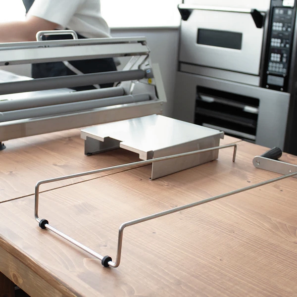 japan dough sheeter parts on countertop
