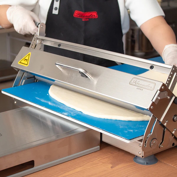 Rolling dough in Japan Kneader large sheeter