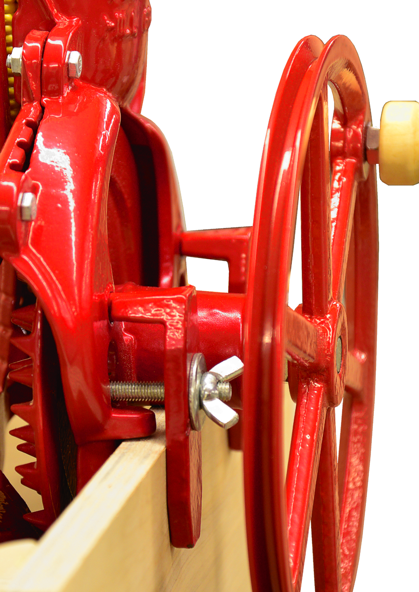 Maximixer hand crank corn sheller rear view with cleats. 